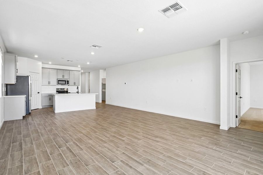Great room, dining and kitchen