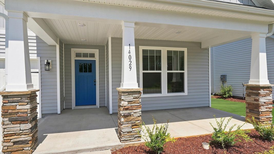 Vibrant home exterior in a thoughtfully planned community near city conveniences Vibrant home exterior in a thoughtfully planned community near city conveniences