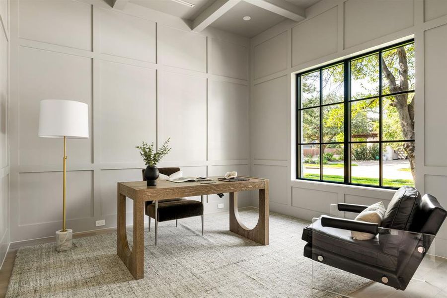 Office area with a decorative wall and beam ceiling Office area with a decorative wall and beam ceiling