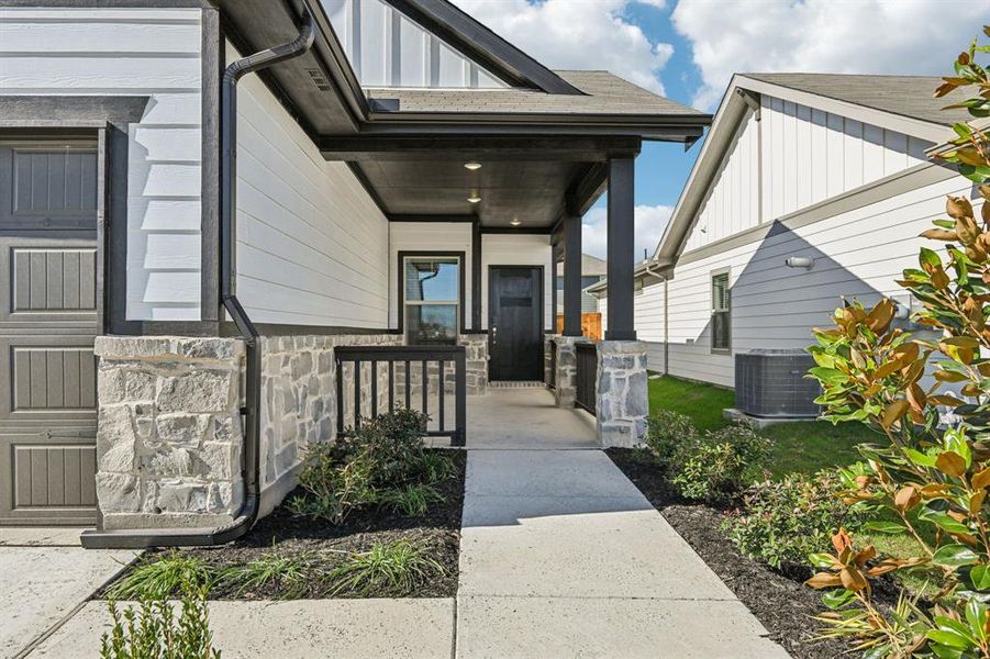 Exterior details and patio area of a home in Lakehaven - Spring Series, Farmersville (Image 4).