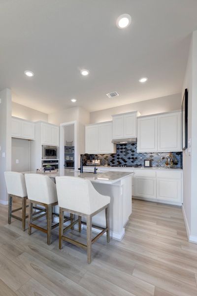 Representative furnished interior of a home built from the Lanport by Scott Felder Homes in Flora, Hutto (Image 9).