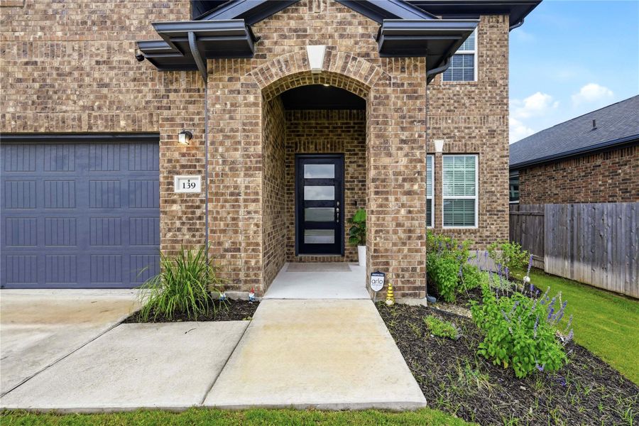 Exterior details and patio area of a home in Sunfield, Buda (Image 3).