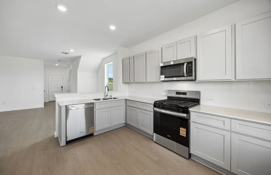 Furnished interior view inside a new home in Windcress, Cove (Image 16).