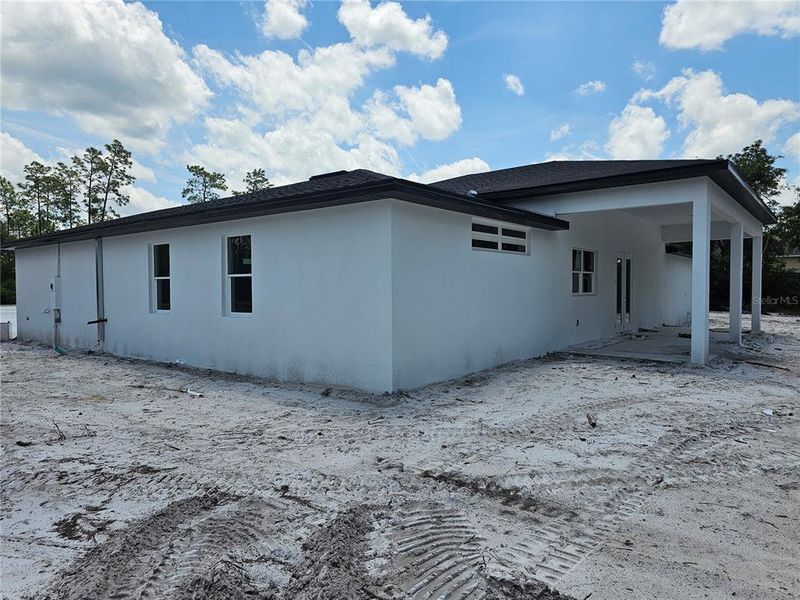 Front exterior of a new home in , Eustis, FL, highlighting curb appeal (Image 1).
