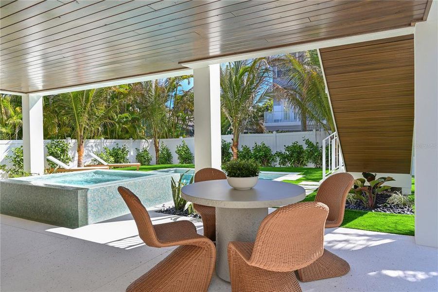 Exterior details and patio area of a home in , Anna Maria (Image 38).
