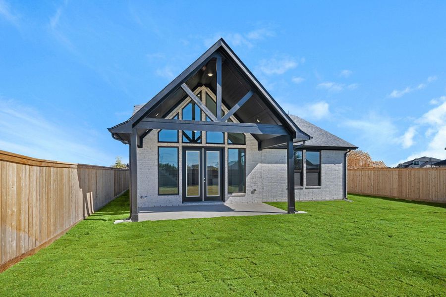 Exterior details and patio area of a home in Bridgeland 45', 50', 70', Cypress (Image 2). Exterior details and patio area of a home in Bridgeland 45', 50', 70', Cypress (Image 2).