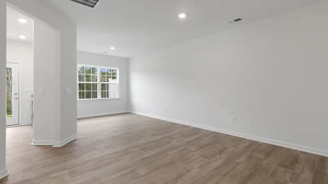 Spacious, unfurnished interior of a new home in The Townes at Galvins Ridge, Sanford (Image 15).