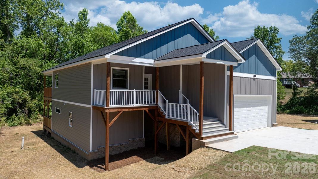 Front exterior of a new home in , Taylorsville, NC, highlighting curb appeal (Image 21).