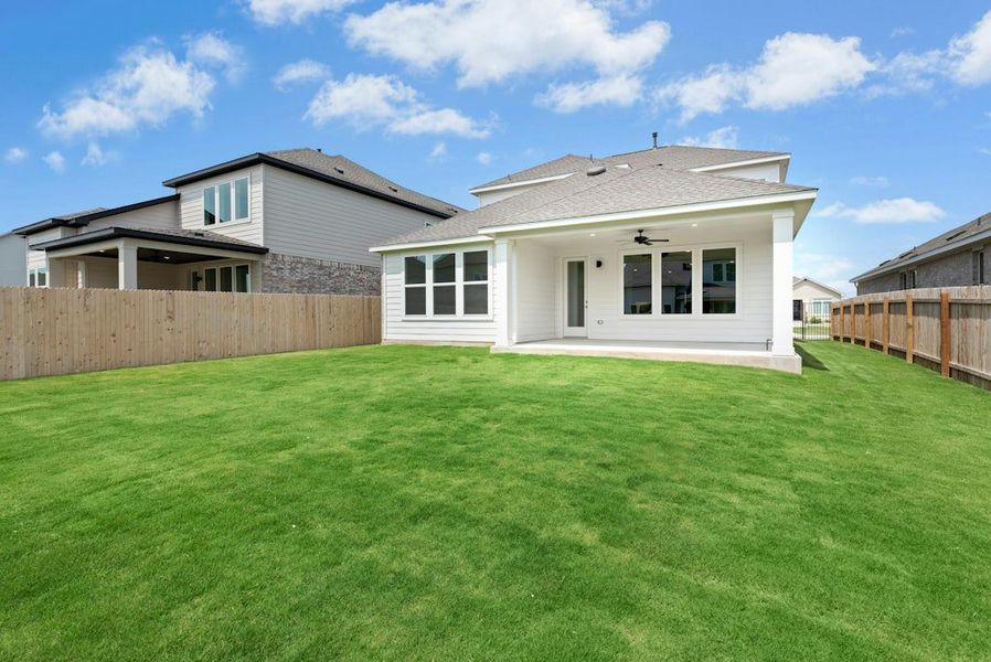 Exterior details and patio area of a home in Santa Rita Ranch, Liberty Hill (Image 19).