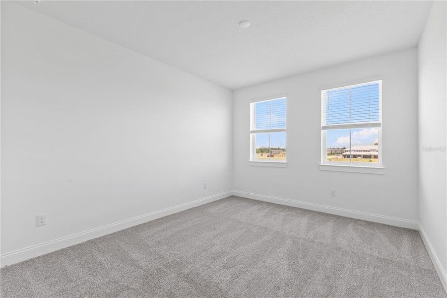 Spacious, unfurnished interior of a new home in Osprey Ranch, Winter Garden (Image 33).