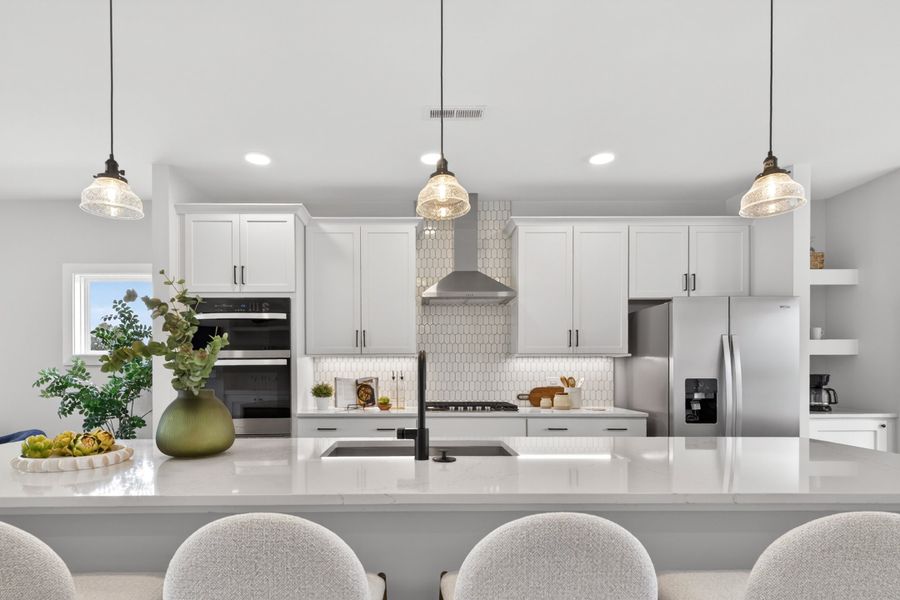 Representative furnished interior of a home built from the Cora End Unit by Baker Residential in Atwater Station - Midtown Collection, Fuquay Varina (Image 8). Representative furnished interior of a home built from the Cora End Unit by Baker Residential in Atwater Station - Midtown Collection, Fuquay Varina (Image 8).