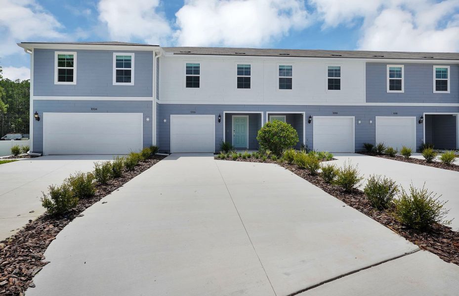 Front exterior of a new home in Normandy Pines, Jacksonville, FL, highlighting curb appeal (Image 1). Front exterior of a new home in Normandy Pines, Jacksonville, FL, highlighting curb appeal (Image 1).