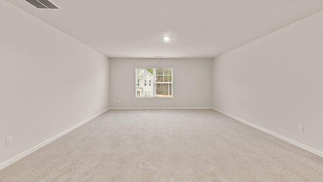 Representative unfurnished interior of a home built from the Mansfield by D.R. Horton in Northwoods at Mirror Lake, Villa Rica (Image 31).