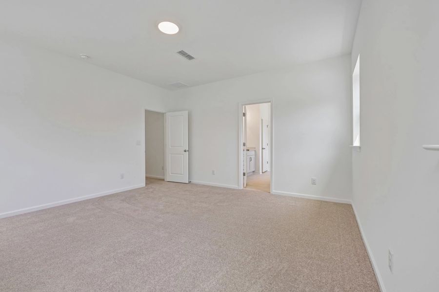 Spacious, unfurnished interior of a new home in Rowland's Grant, Fuquay Varina (Image 27).