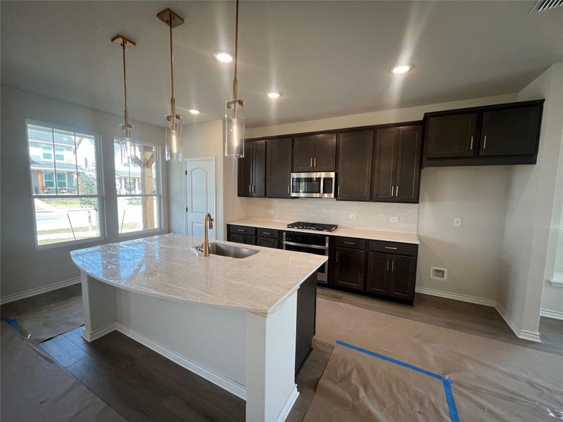 In-progress construction of a new home in Lariat, Liberty Hill, TX (Image 28).