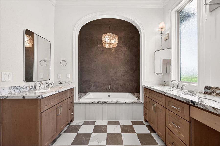 This primary bath is full of exquisite details.
