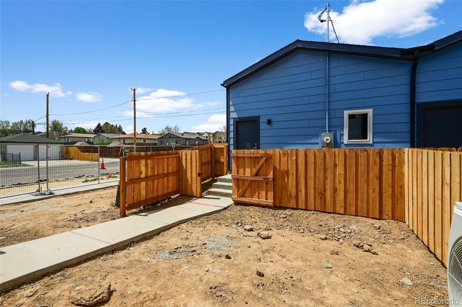 Front exterior of a new home in , Aurora, CO, highlighting curb appeal (Image 1).