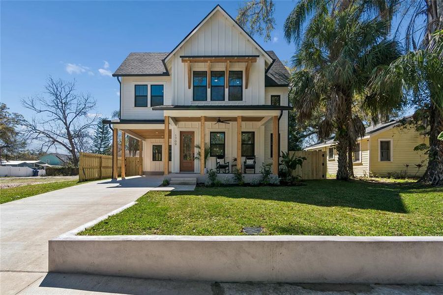 Front exterior of a new home in , Tampa, FL, highlighting curb appeal (Image 1). Front exterior of a new home in , Tampa, FL, highlighting curb appeal (Image 1).
