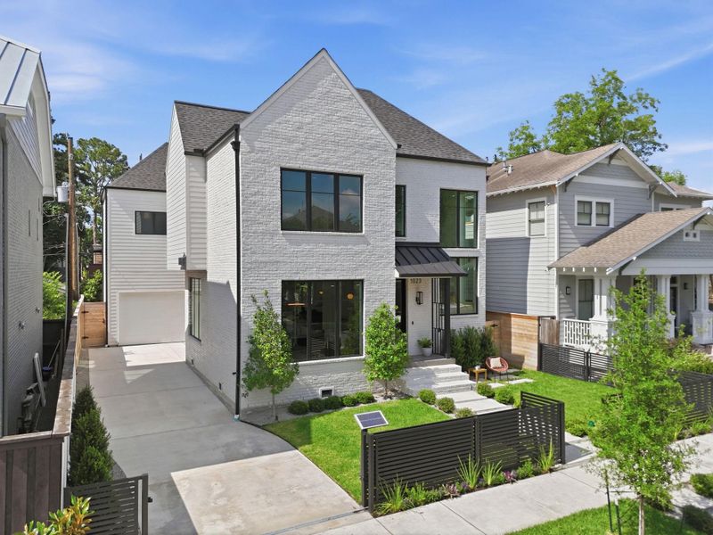 Long spacious driveway, perfect for play time or added parking within the secure fully fenced yard. Long spacious driveway, perfect for play time or added parking within the secure fully fenced yard.