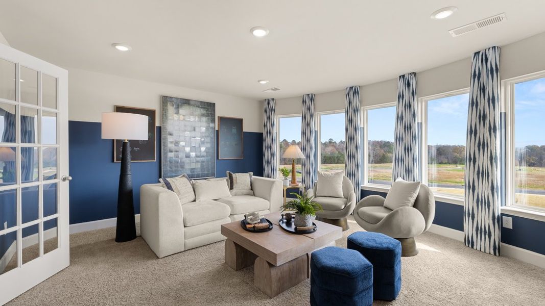 Representative furnished interior of a home built from the Savannah by D.R. Horton in Evergreen Crossing, Locust Grove (Image 33).