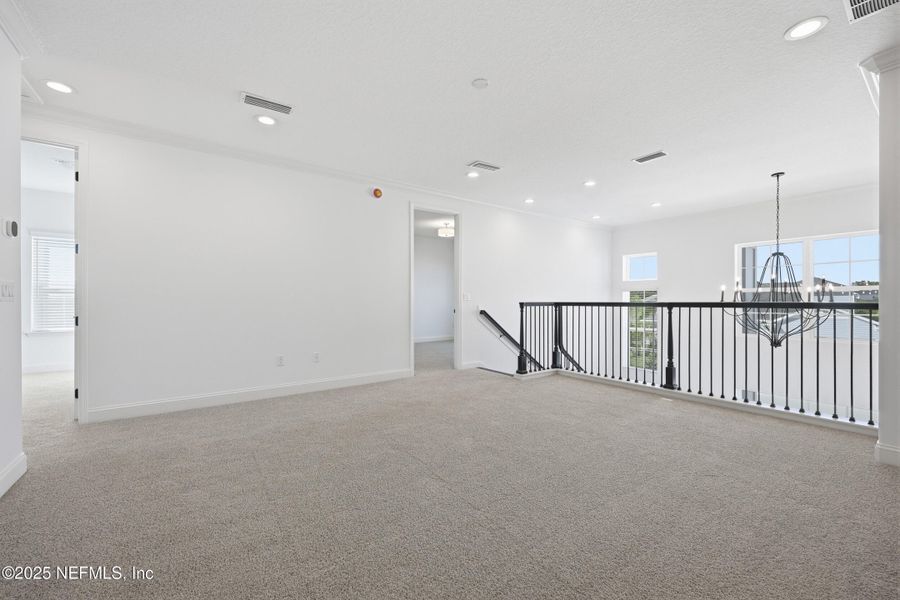 Spacious, unfurnished interior of a new home in Silver Landing At Silverleaf, St. Augustine (Image 28).