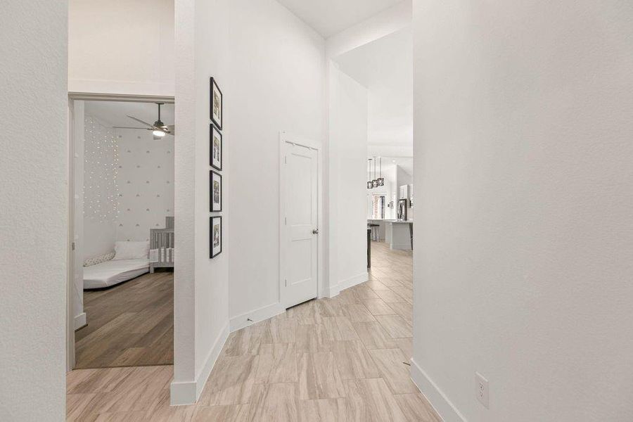 A spacious, extended foyer welcomes you in, offering a clear and seamless flow to the rest of the home. A spacious, extended foyer welcomes you in, offering a clear and seamless flow to the rest of the home.