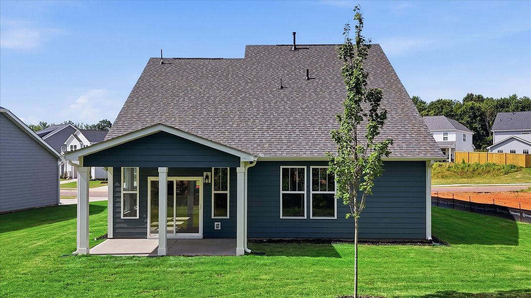 Highly functional rear covered porch adds memorable living space to this elegant home located in Anderson, SC