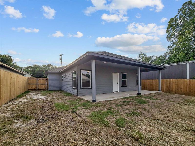 Back of house featuring a patio area and a fenced backyard Back of house featuring a patio area and a fenced backyard