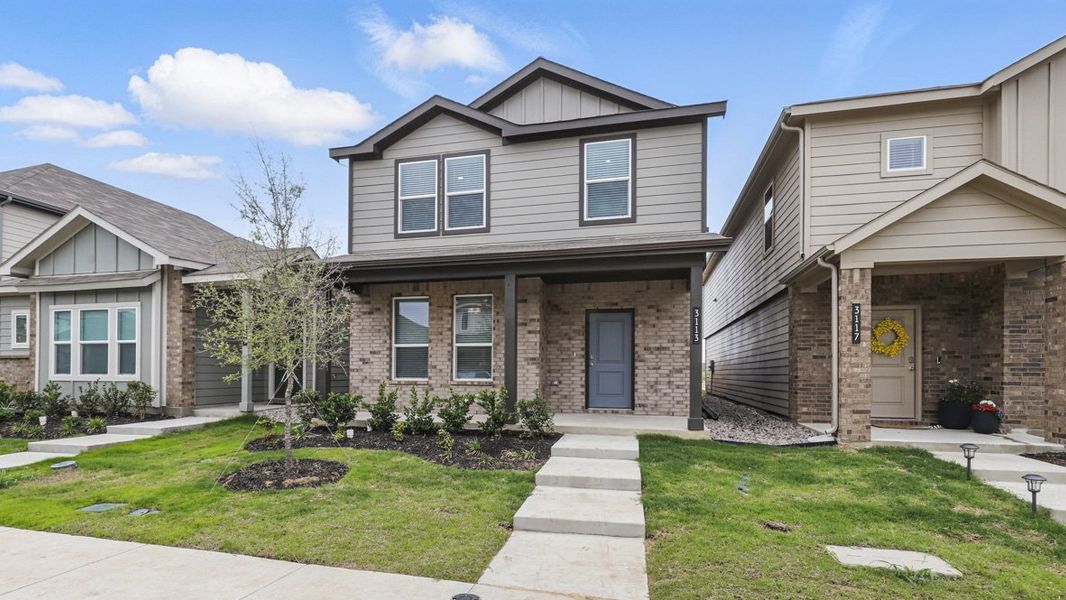 Representative exterior photo of a completed home built from the HAZELNUT by D.R. Horton in Orchard Village, Fort Worth, TX (Image 2).