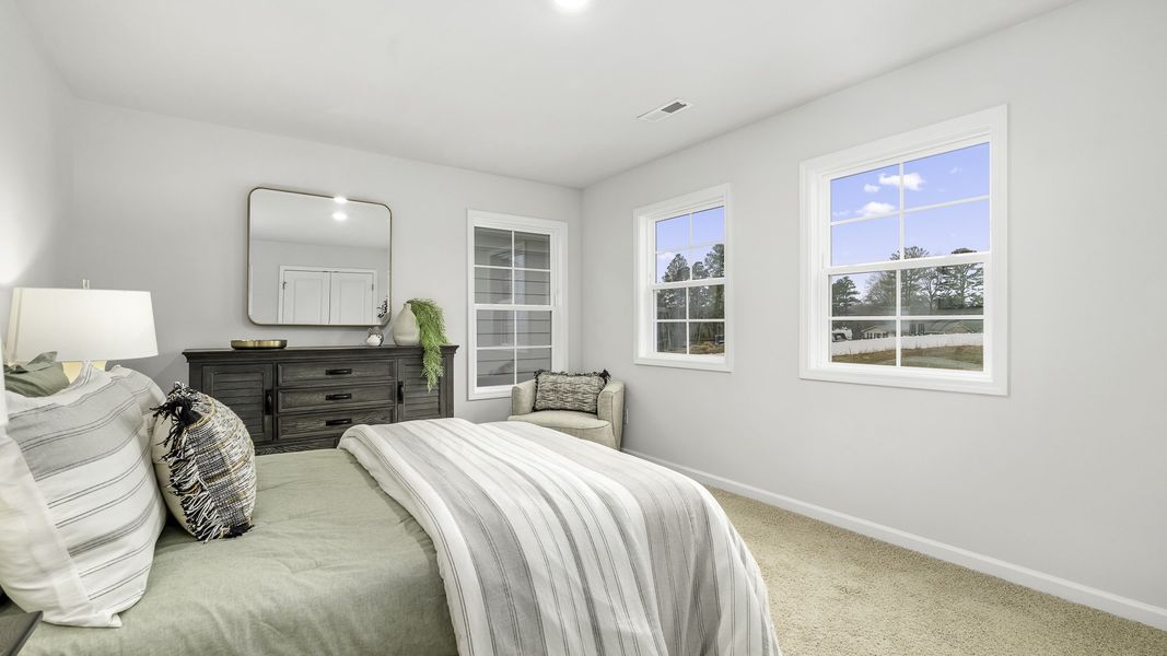 Furnished interior view inside a new home in Lybrook Village, Advance (Image 14).