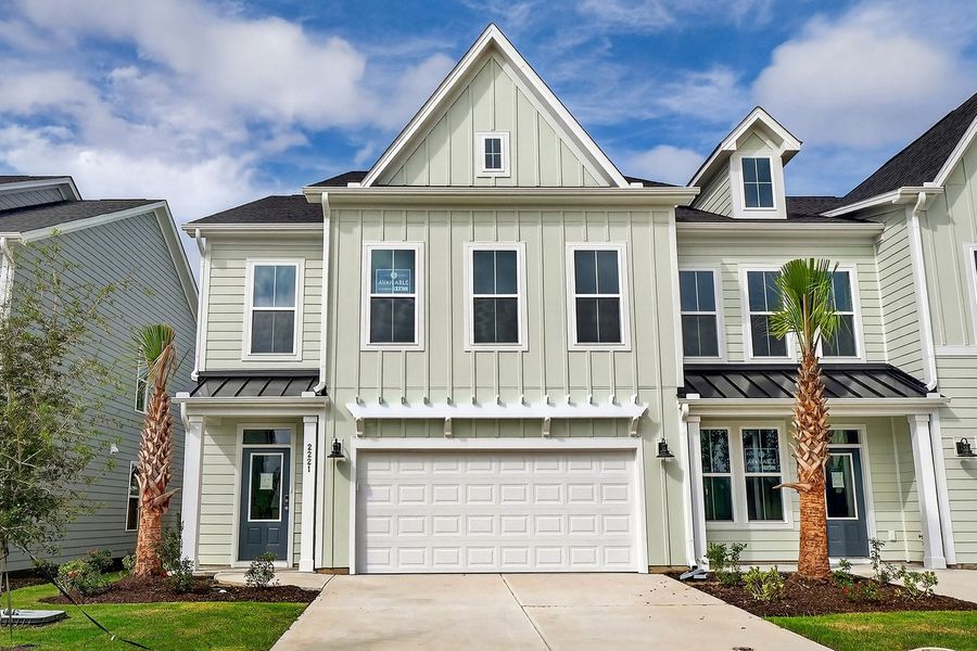 Front exterior of a new home in Grand Park, Leland, NC, highlighting curb appeal (Image 1). Front exterior of a new home in Grand Park, Leland, NC, highlighting curb appeal (Image 1).