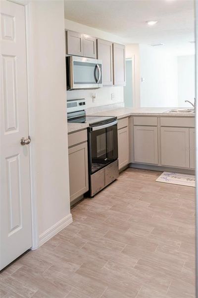 Furnished interior view inside a new home in , Palm Coast (Image 45).