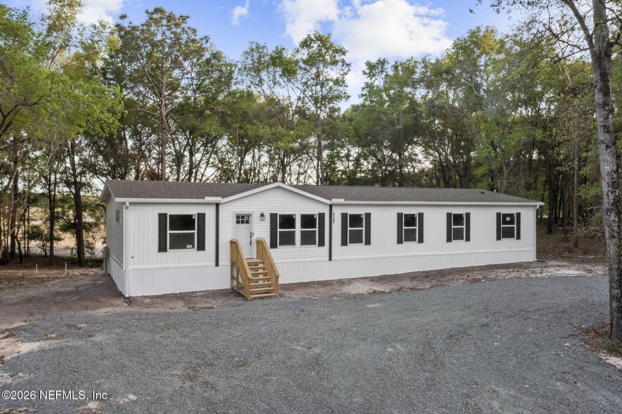 Exterior details and patio area of a home in , Keystone Heights (Image 24).