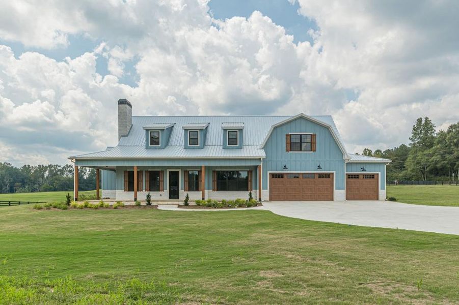 Front exterior of a new home in , Bremen, GA, highlighting curb appeal (Image 23).