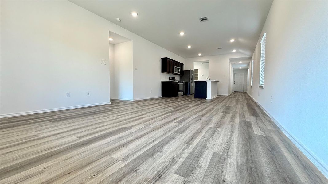 Durable vinyl flooring throughout the main living areas—stylish, low-maintenance, and built to handle everyday life.