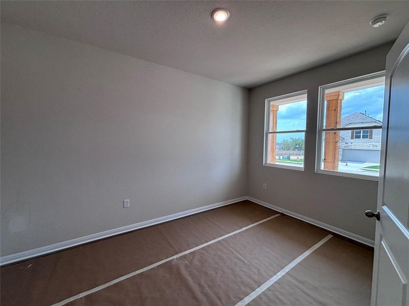 In-progress construction of a new home in The Colony, Bastrop, TX (Image 18).