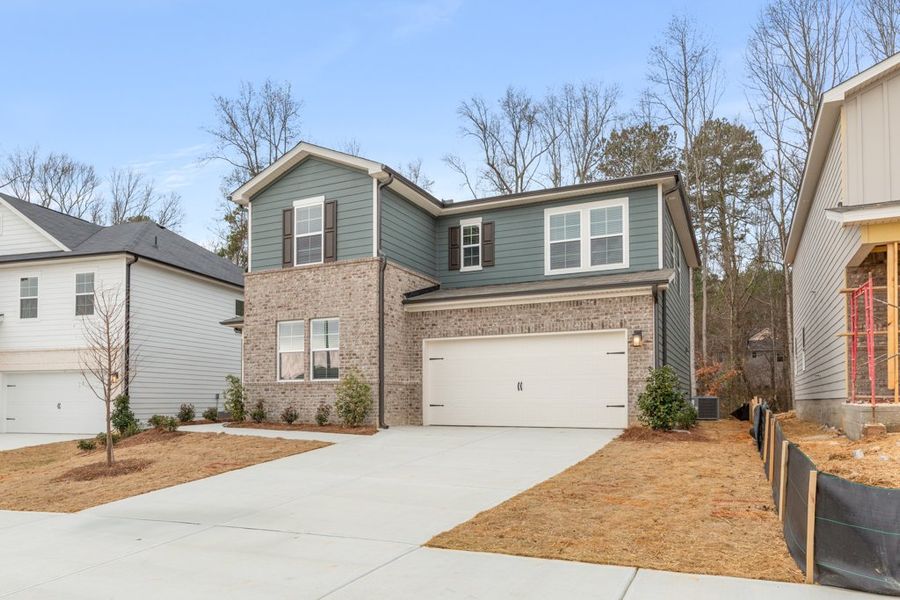 A house with a garage. A house with a garage.
