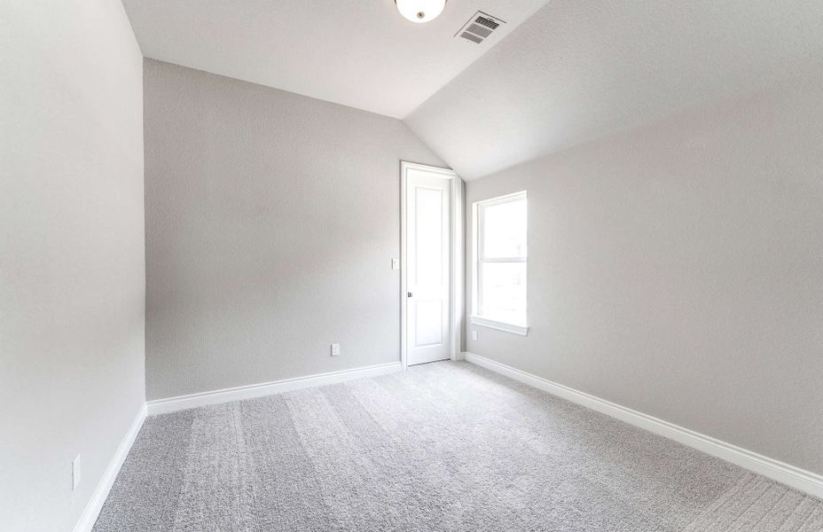 Representative unfurnished interior of a home built from the 2870 by Ravenna Homes in The Woodlands Hills 65′, Willis (Image 34). Representative unfurnished interior of a home built from the 2870 by Ravenna Homes in The Woodlands Hills 65′, Willis (Image 34).