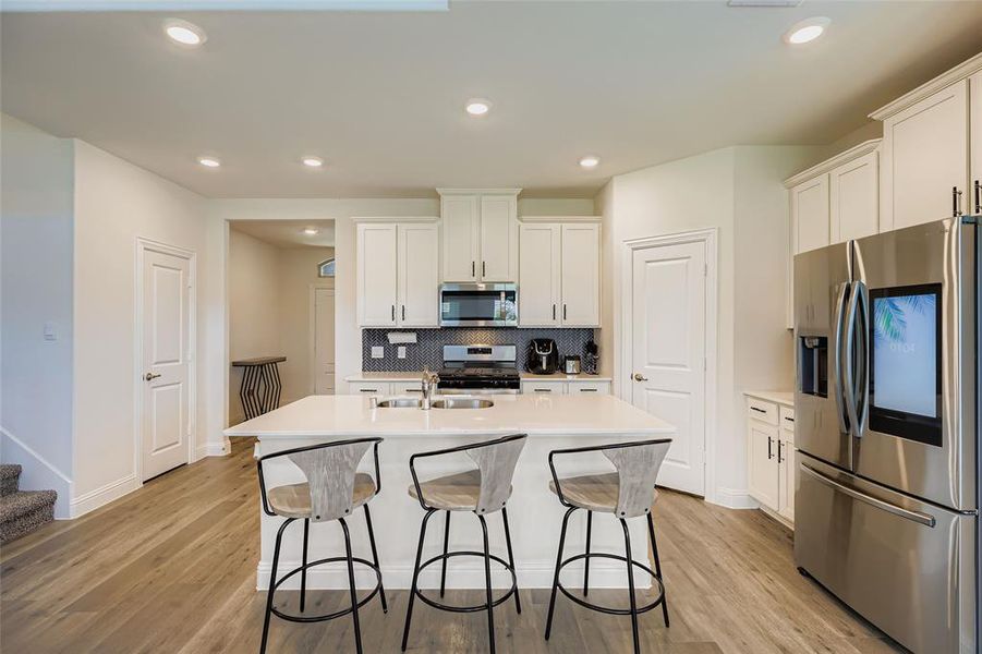 Furnished interior view inside a new home in , Little Elm (Image 12).