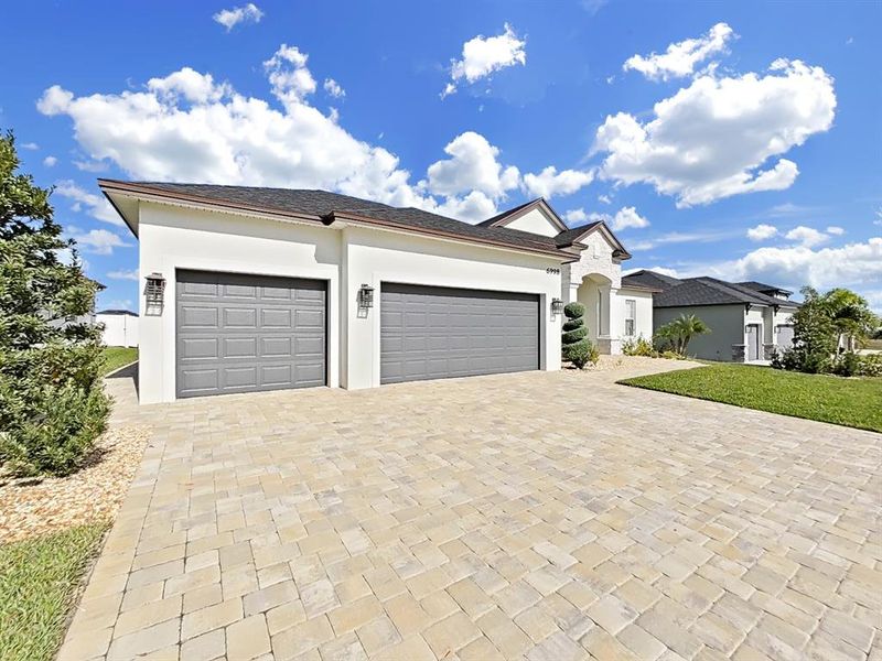 Front exterior of a new home in , Lakeland, FL, highlighting curb appeal (Image 24).