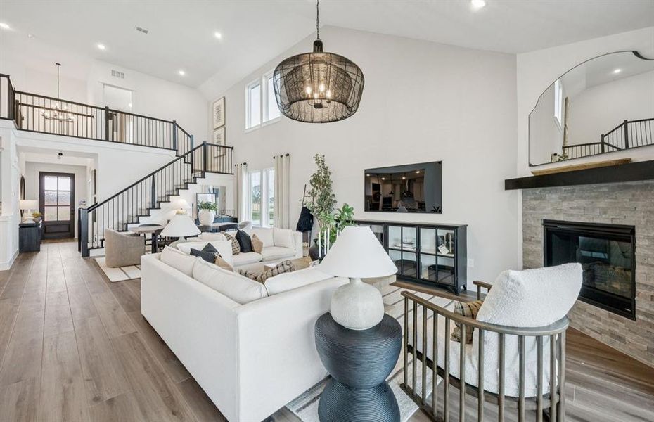 Open-concept with soaring ceilings *model representation