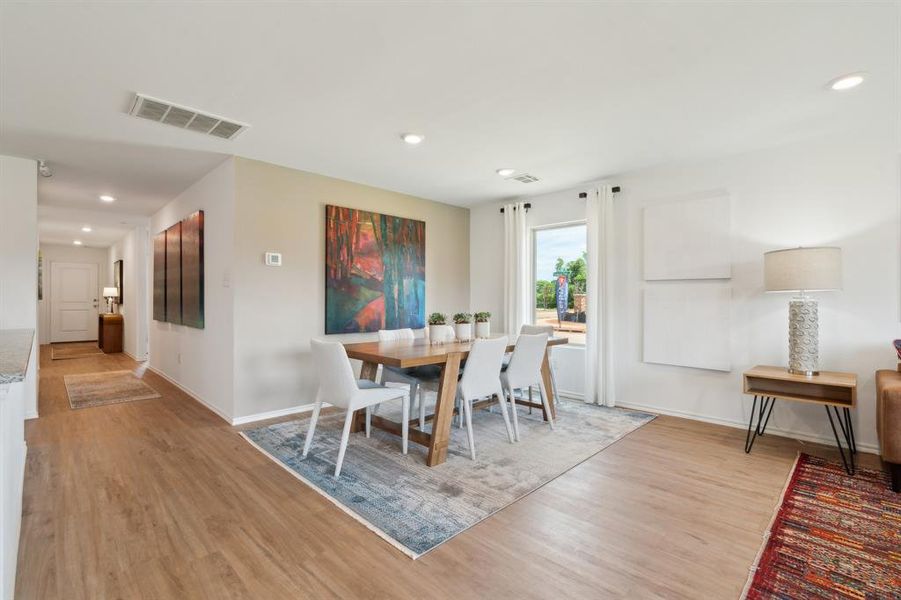 Dining space featuring light wood-type flooring