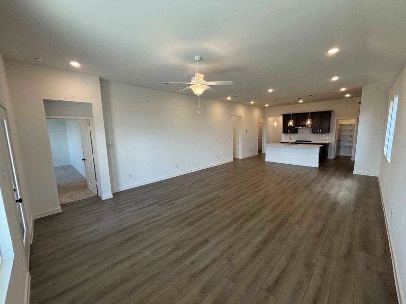 Open Kitchen-Living-Dining Room Construction Progress featuring the Oxford Collection