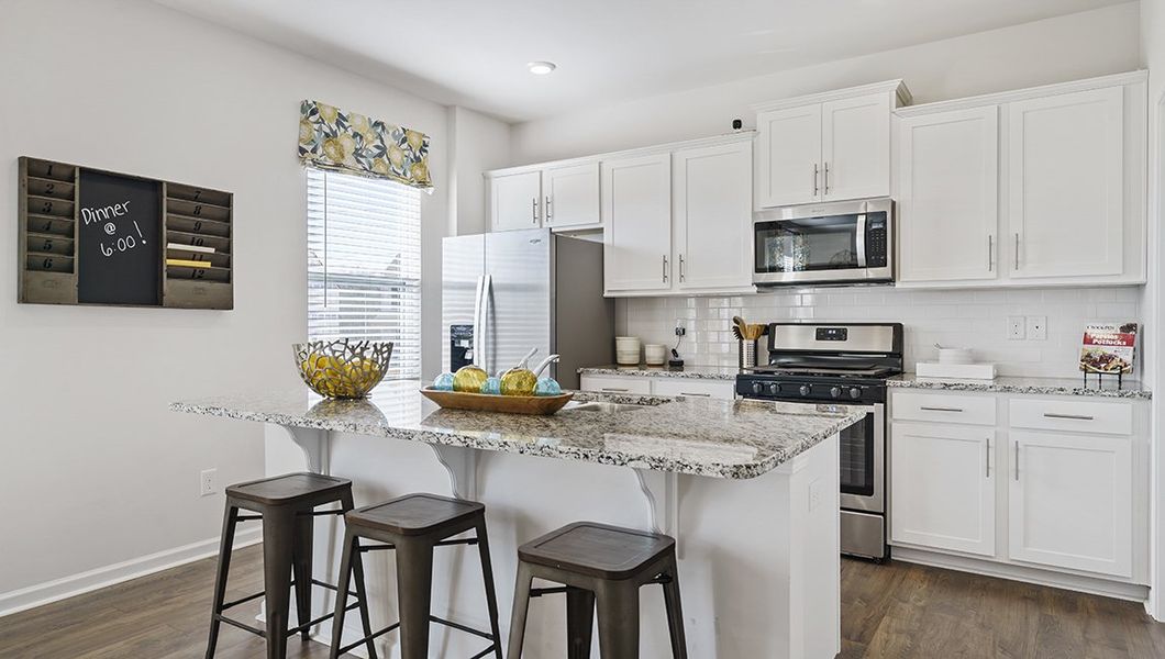 Representative furnished interior of a home built from the Penwell by D.R. Horton in Sage Grove, Lyman (Image 8).