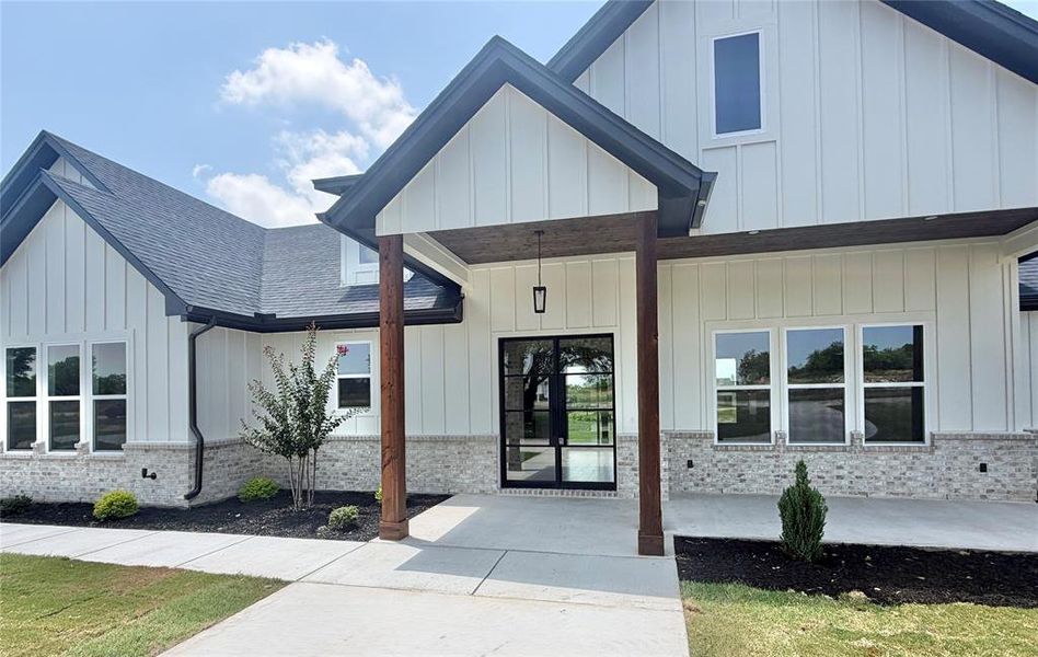 Front exterior of a new home in , Weatherford, TX, highlighting curb appeal (Image 27).