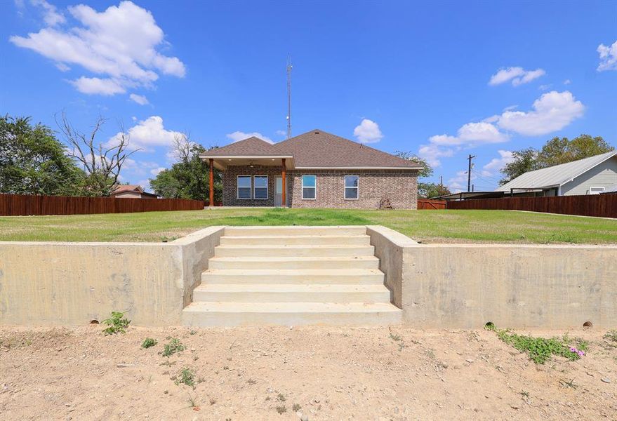Front exterior of a new home in , Weatherford, TX, highlighting curb appeal (Image 23). Front exterior of a new home in , Weatherford, TX, highlighting curb appeal (Image 23).