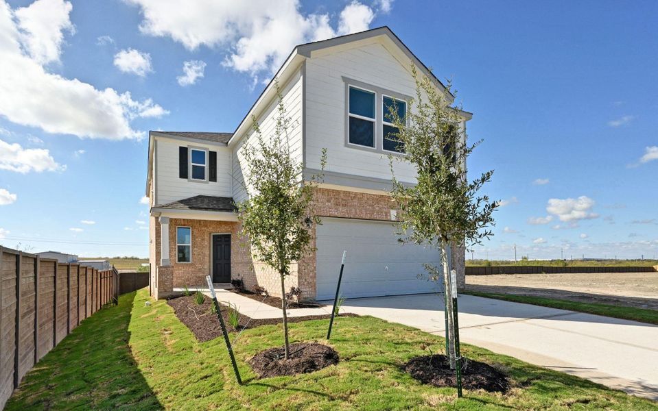 Front exterior of a new home in Stoney Chase, Del Valle, TX, highlighting curb appeal (Image 2).