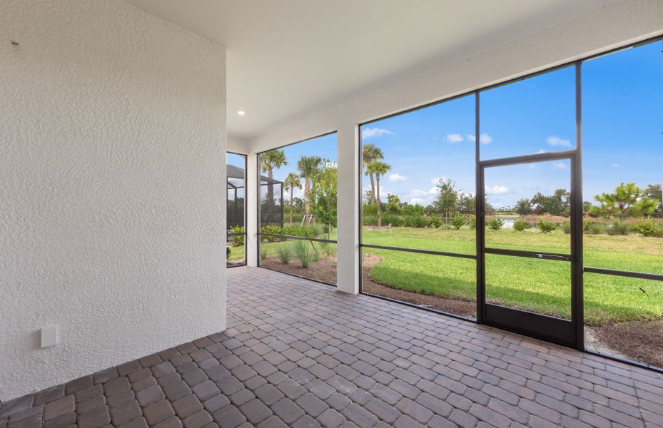 Exterior details and patio area of a home in TerraWalk at Babcock Ranch, Alva (Image 1). Exterior details and patio area of a home in TerraWalk at Babcock Ranch, Alva (Image 1).
