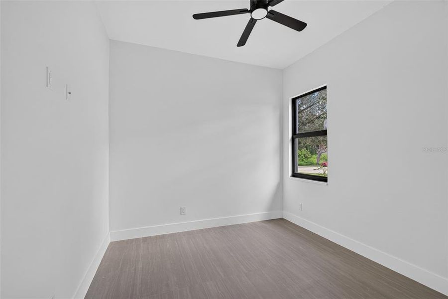 Spacious, unfurnished interior of a new home in , Port Charlotte (Image 24).