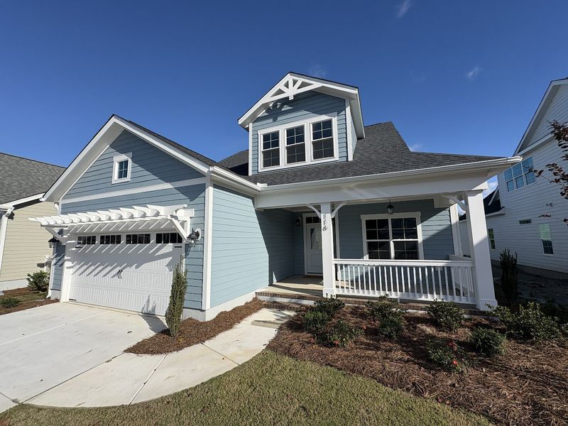 Exterior details and patio area of a home in Riverside Cove, Wilmington (Image 1).